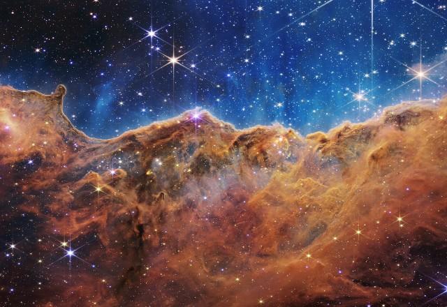 Esta imagem revela pela primeira vez áreas previamente invisíveis de nascimento de estrelas | Reprodução/Nasa

