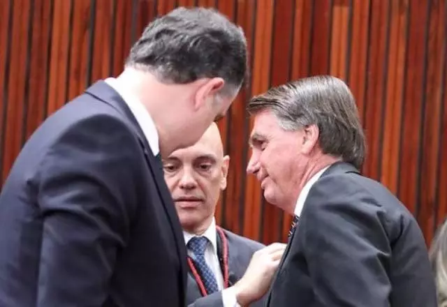 Moraes e Bolsonaro, em encontro em solenidade no TSE | Divulgação/TSE

