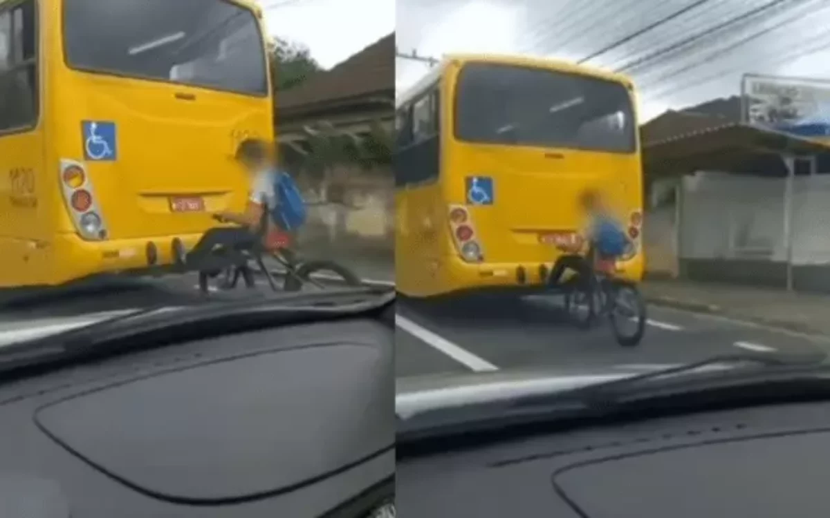 Carona inusitada! Ciclista se agarra em ônibus de Joinville e viraliza;  veja o vídeo